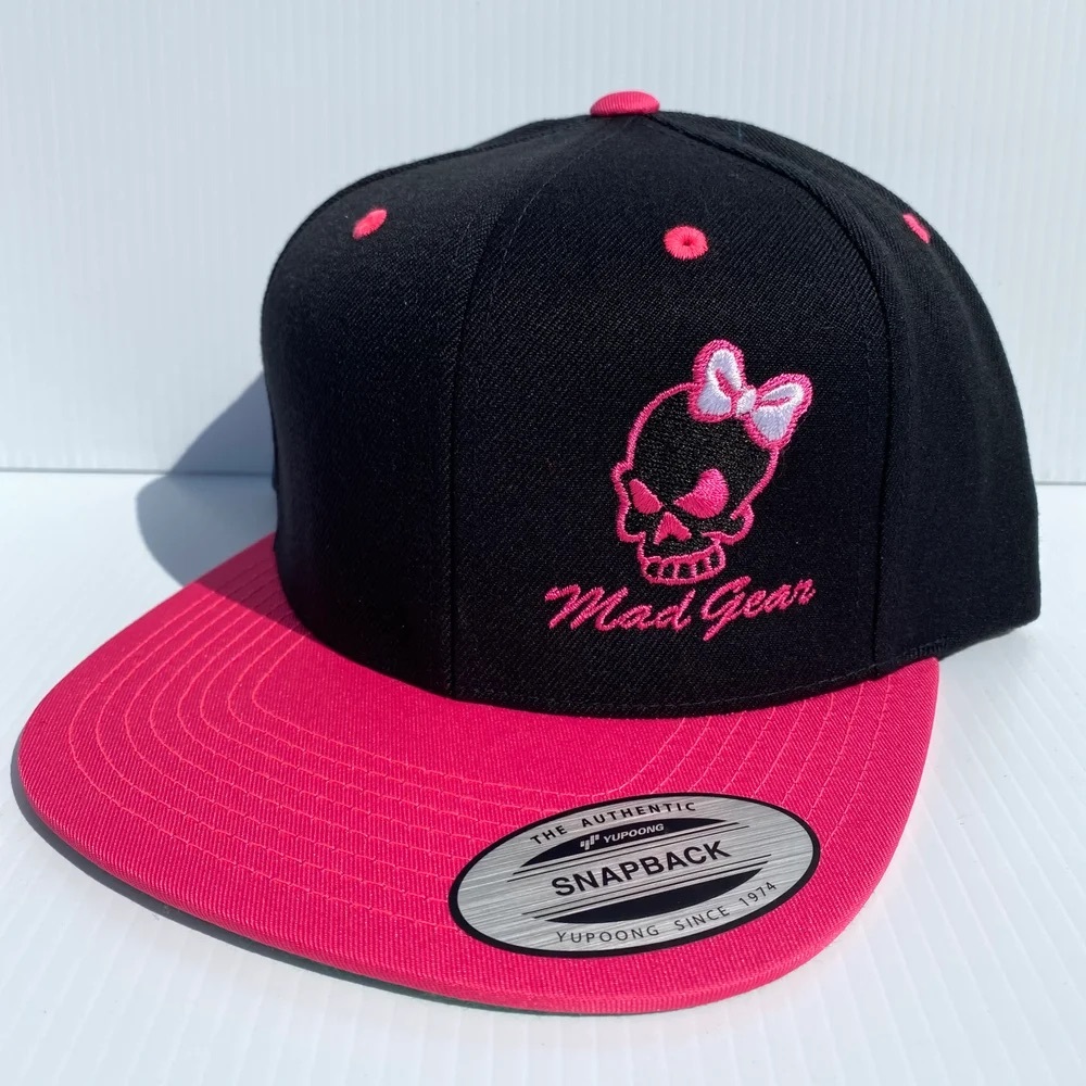 SnapBack • Pink Bill with a Skull with a bow.